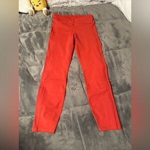 Vuori Stride Legging with pockets color Poppy women's size medium NWOT